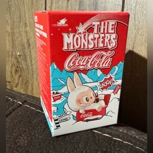 A Blind Box Coca Cola Arctic Monsters Toy - Red and Blue
